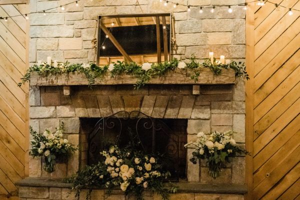 Fireplace decor flowers candles lights