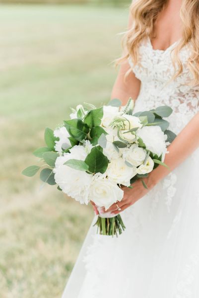 Bouquet of flowers close up lace dress detail