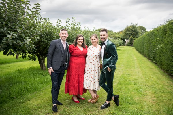 Eoin & Darran Real Wedding exterior groom happy family smiling shot