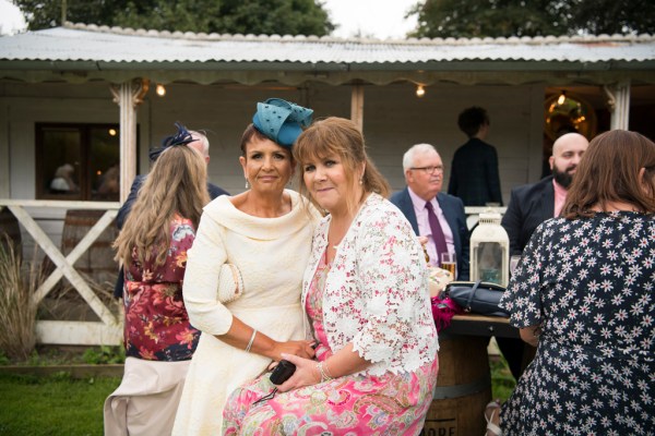 Eoin & Darran Real Wedding guests mother friends dress hat design exterior shot