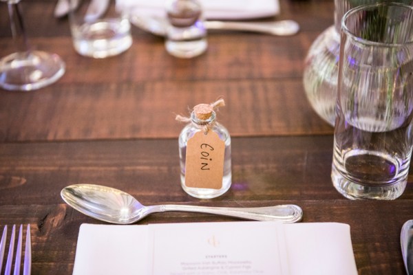 Eoin & Darran Real Wedding Eoin bottle table setting interior tent