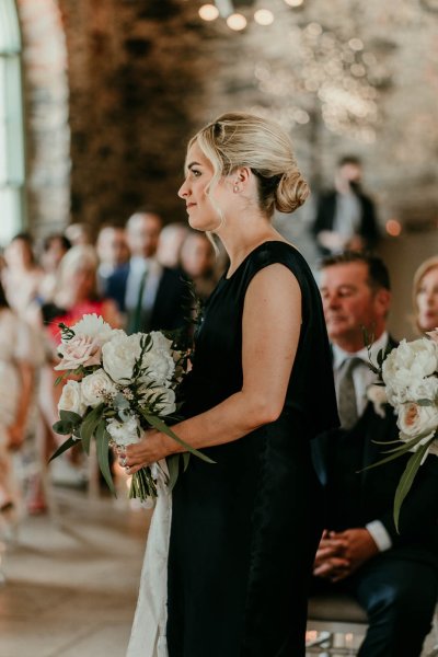 bridesmaid in black dress