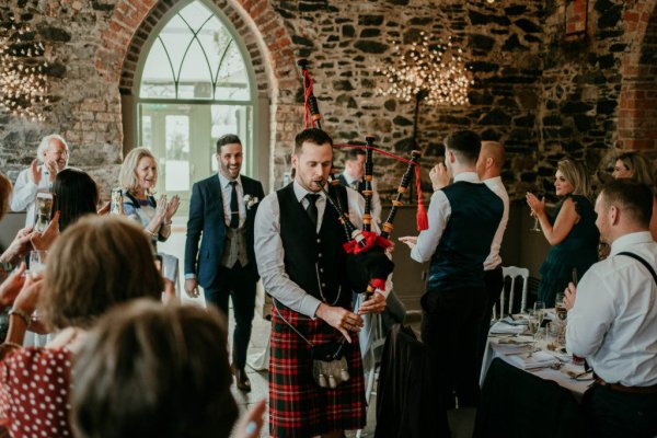 pipe band in kilt wedding entrance