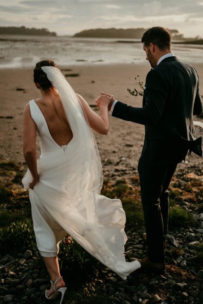 bride and groom on beach