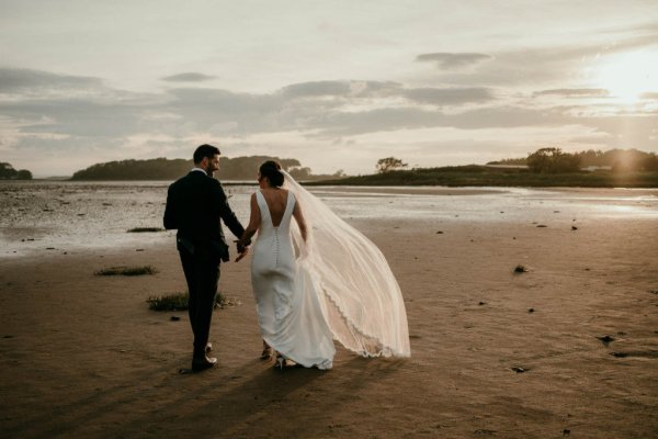 bride and groom on beach