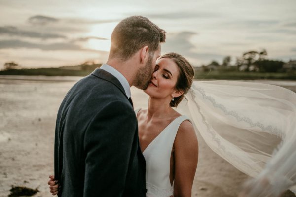 bride and groom on beach