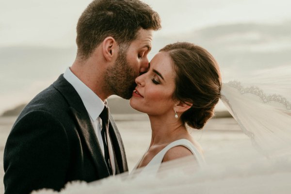 bride and groom on beach