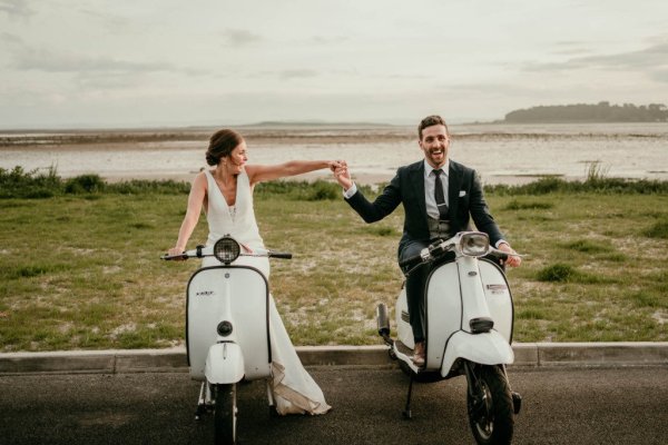 bride and groom on vespas