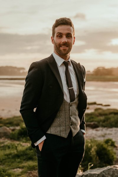 groom in wedding suit