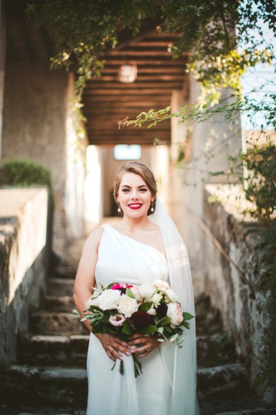 Bride photography exterior steps house home manor flowers bouquet