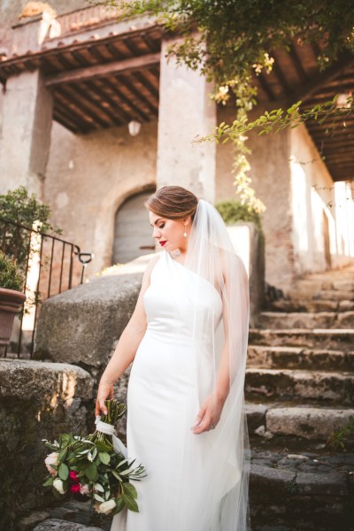 Bride photography exterior steps house home manor looking down flowers bouquet