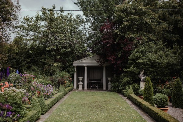 Exterior garden flowers tree statue