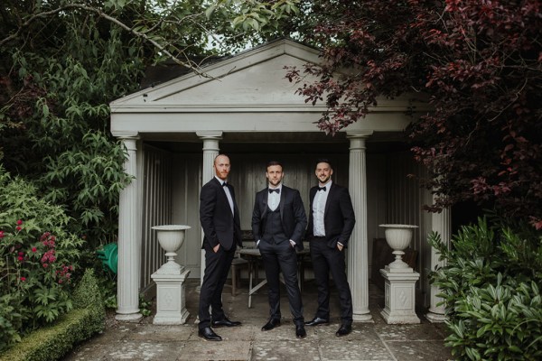 Groomsmen groom exterior garden smiling happy best man