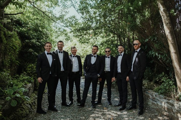 Exterior groomsmen groom best man smiling sunglasses forest garden