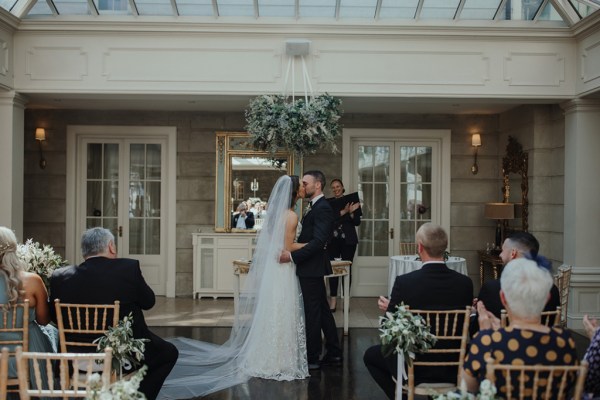 You may kiss the bride official groom clapping celebration ceremony guests