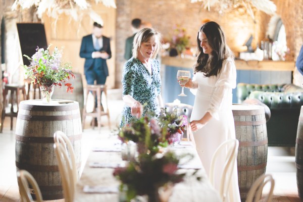 Bride wine table setting flowers