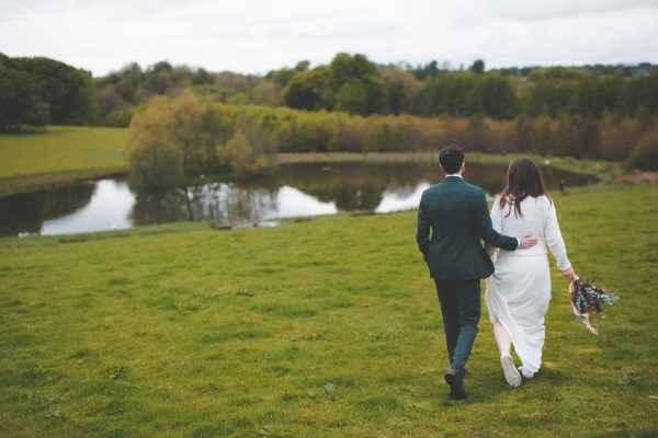 Exterior shot eucalyptus flowers bride groom