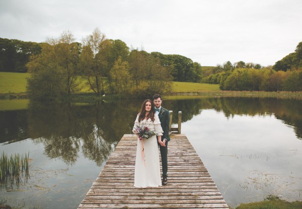 Exterior shot eucalyptus flowers bride groom