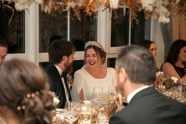 Real Wedding Tracey & Ultan bride groom laughing guests