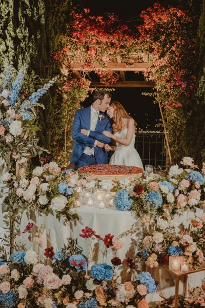 bride and groom with cake