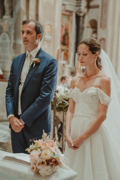 bride and groom in church