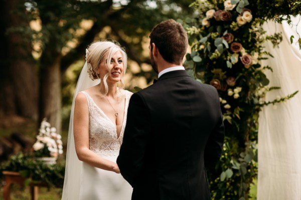 bride and groom saying vows