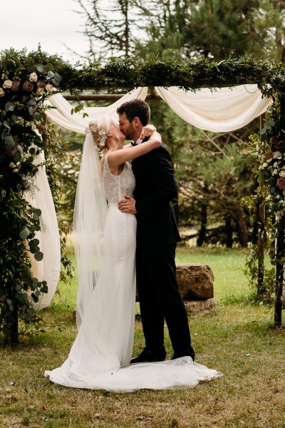 bride and groom saying vows