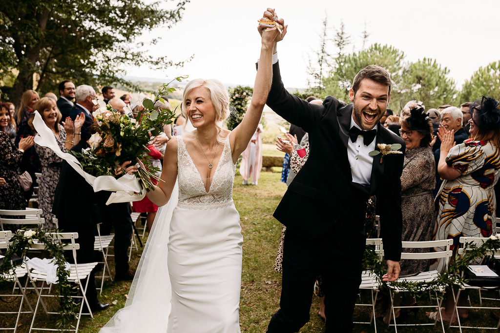 happy bride and groom aisle