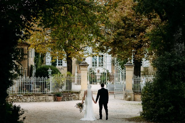 bride and groom outside venue