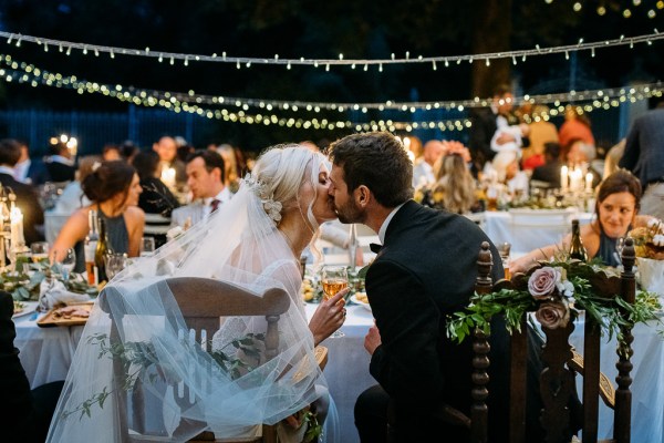 kissing bride and groom