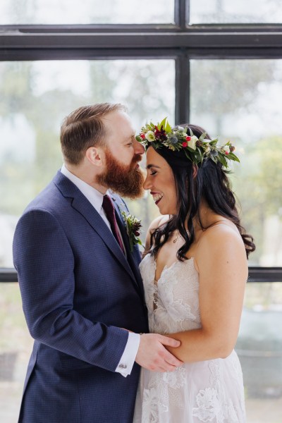 Groom kisses bride on forehead Olga Hogan Photography: Hannah & Eoghan