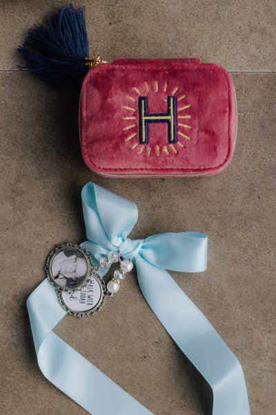 Something blue, Locket or charm memento and bridal handbag Olga Hogan Photography: Hannah & Eoghan