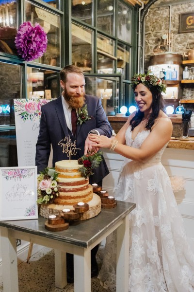 Bride and groom cut wedding cake Olga Hogan Photography: Hannah & Eoghan