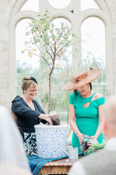 bride and groom top of altar tree planting ceremony