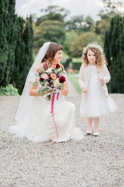 bride with flower girl