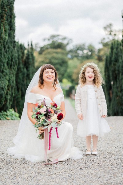 bride with flower girl