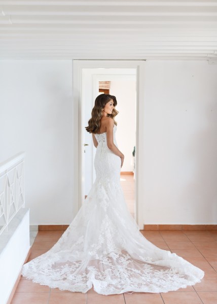 Bride train elegant dress white wavy hair interior detail