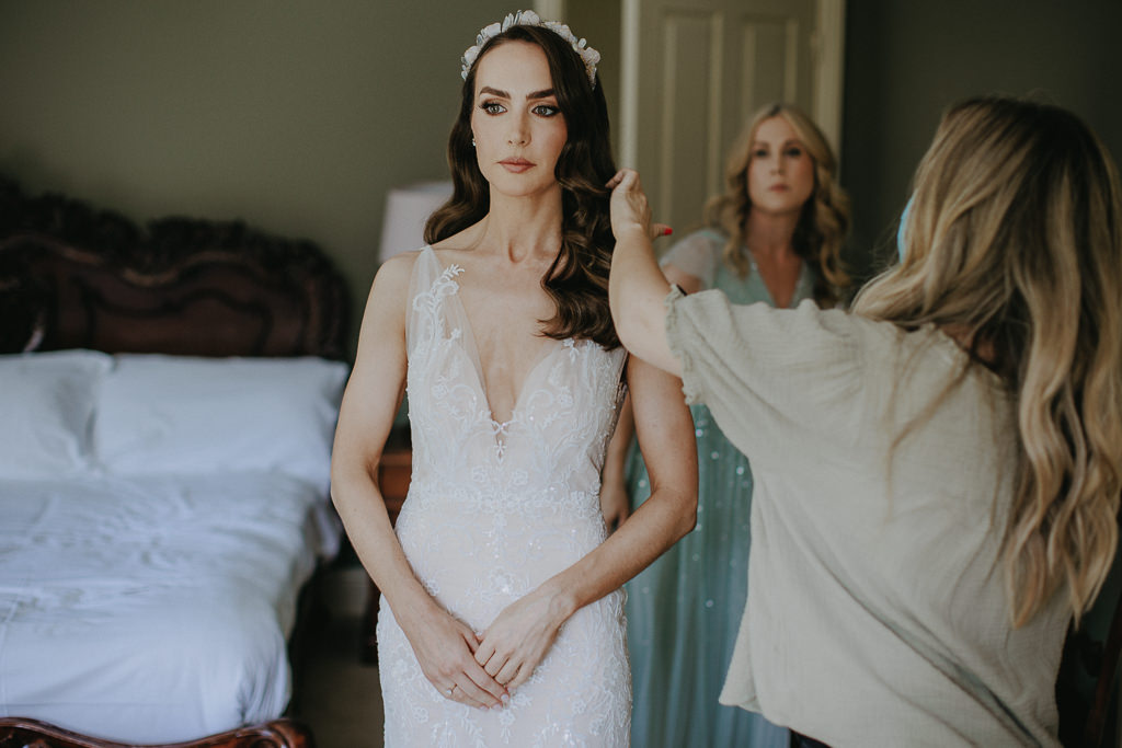 bride getting ready vintage dress curly hair