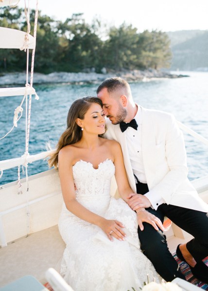 Bride and groom sea beach yacht boat exterior