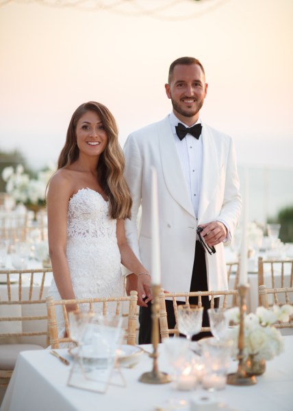 Bride and groom exterior ceremony table candle