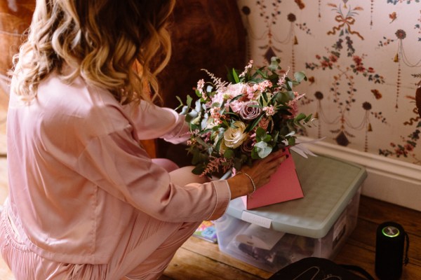 Bride with bouquet of pink and white roses