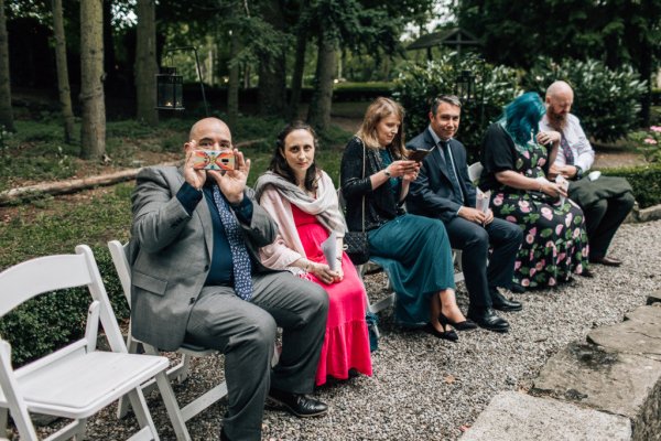 Guests waiting for wedded couple ceremony