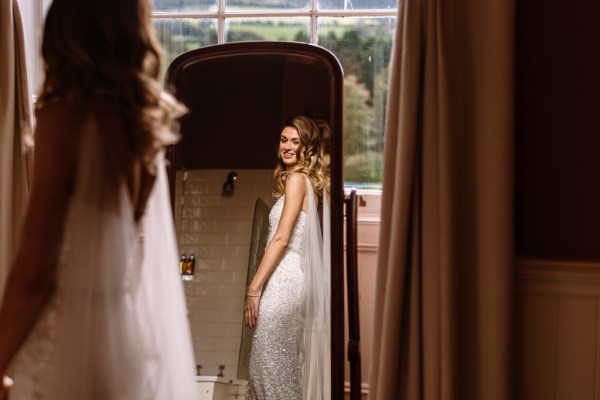 bride in sequin dress with waves in hair