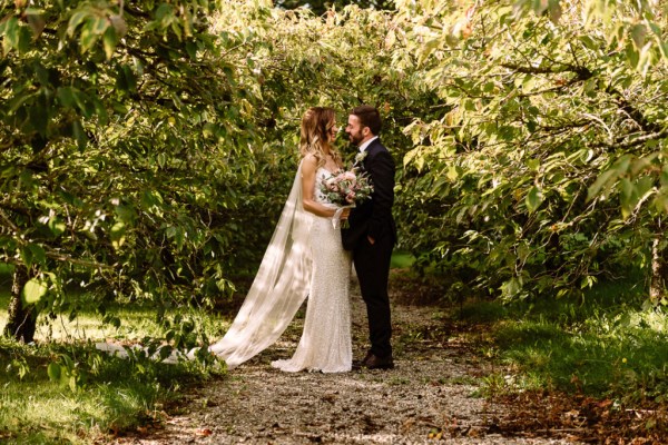 bride and groom couple kiss