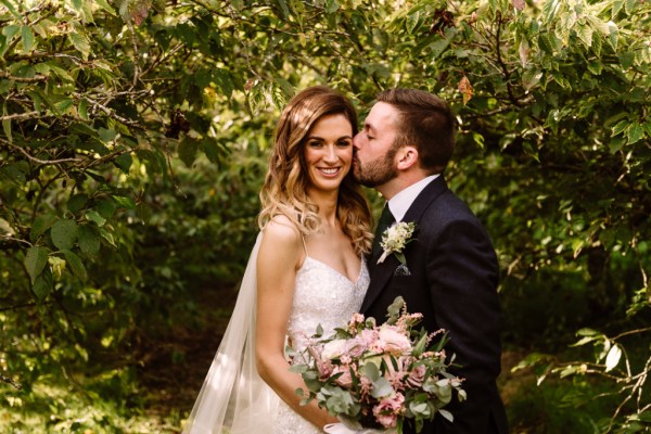 bride and groom couple kiss