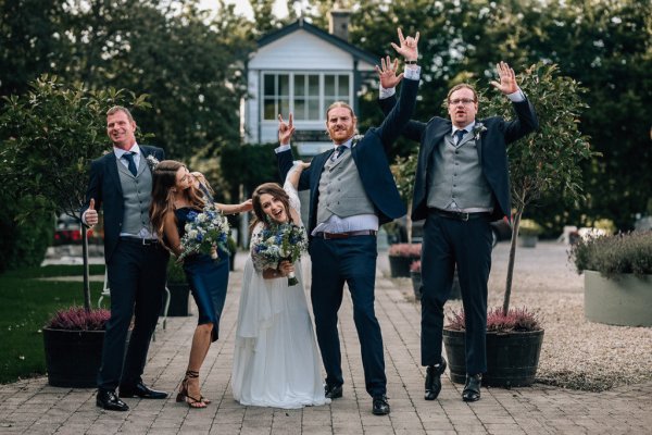 Bride groom cheers celebrations groomsmen bridesmaids