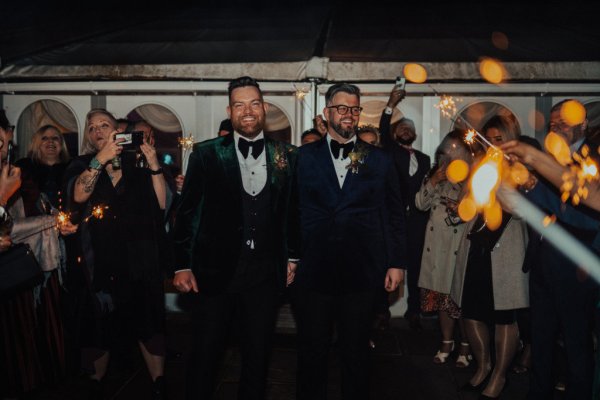 groom and groom mr and mr in tuxedos