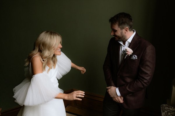 Bride groom playful laughing couple