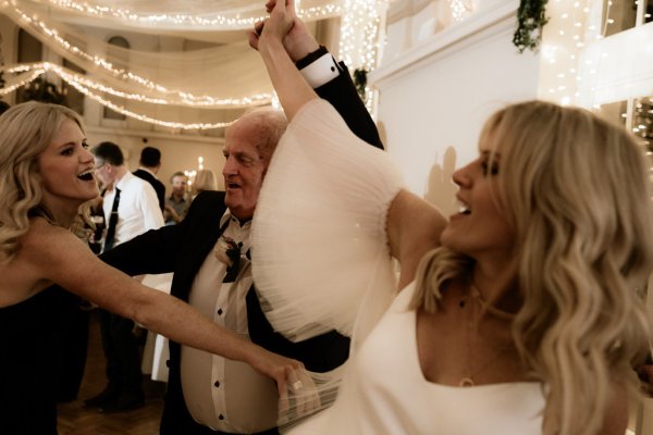 Bride cheers celebrating dancing