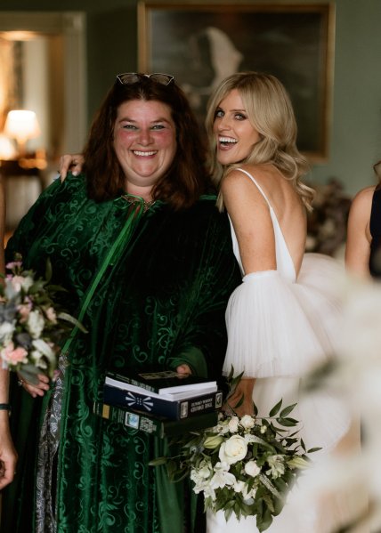 Bride smiles with guests